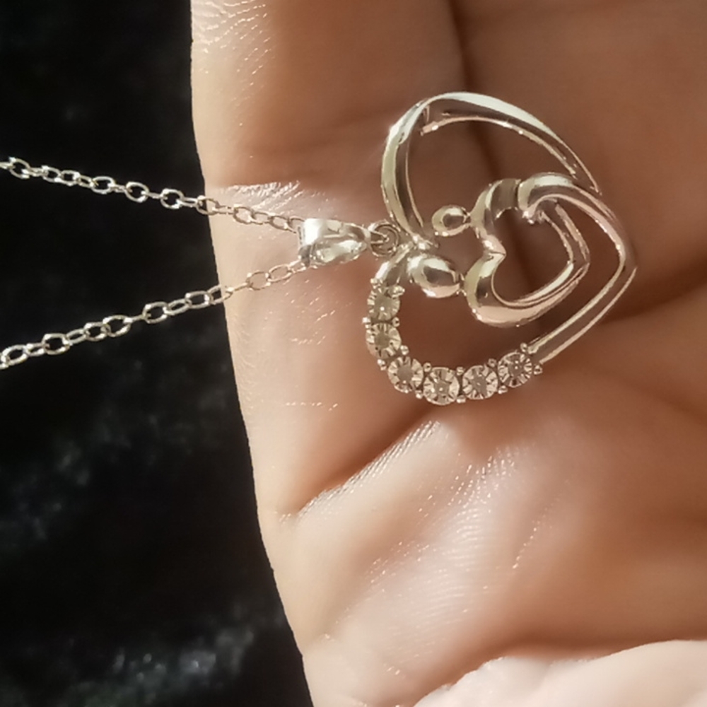 Tender loving care heart pendant  necklace 925 sterling silver 18 inches.